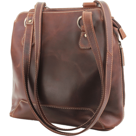 Brown leather handbag with a shoulder strap on a white background - okotoks hc pharmacy