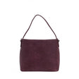Purple handbag on a white background - okotoks hc pharmacy