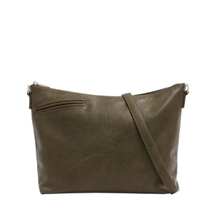 Green leather shoulder bag on a white background - okotoks hc pharmacy