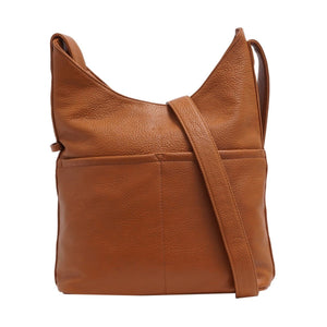 Brown leather shoulder bag on a white background. - okotoks hc pharmacy