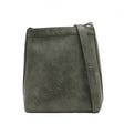 Green leather crossbody bag on a white background - okotoks hc pharmacy