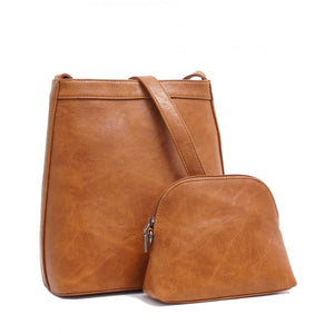 Brown leather handbag with matching pouch on a white background - okotoks hc pharmacy