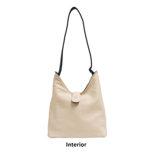 Beige handbag with a black strap on a white background - okotoks hc pharmacy