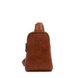 Brown leather sling bag on a white background - okotoks hc pharmacy