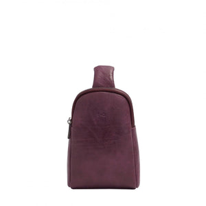 Purple leather sling bag on a white background - okotoks hc pharmacy