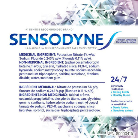 A white informational card for Sensodyne sensitivity protection, featuring the brand name in large blue letters, ingredient details in French and English, and a blue '24/7' badge with geometric crystal graphics in the background. - okotoks hc pharmacy