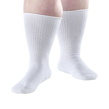 A pair of white ribbed crew socks worn on a person's feet, shown against a plain white background. - okotoks hc pharmacy