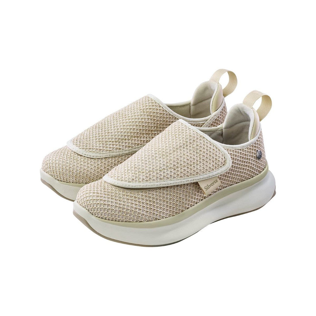 Pair of beige slip-on sneakers on a white background - okotoks hc pharmacy