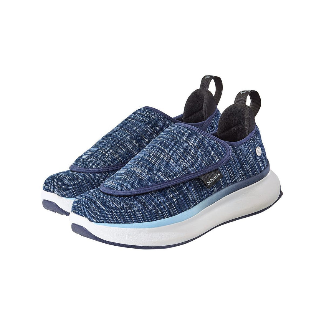 Blue slip-on sneakers with white soles on a white background - okotoks hc pharmacy