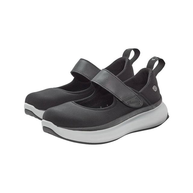Pair of black Mary Jane shoes with white soles on a white background - okotoks hc pharmacy