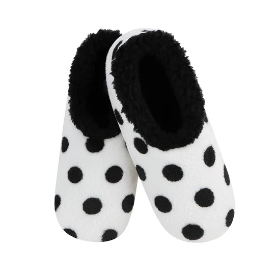 Pair of black and white polka dot slippers with fluffy black interior on a white background - okotoks hc pharmacy