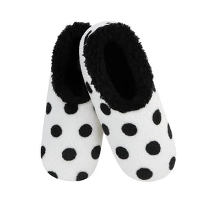 Pair of black and white polka dot slippers with fluffy black interior on a white background - okotoks hc pharmacy