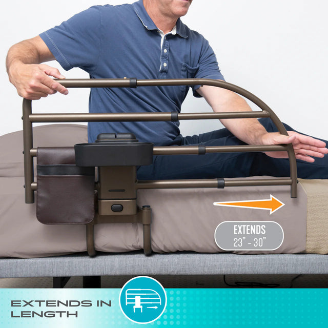 Person using a bed rail extension system with an arrow indicating its length range. - okotoks hc pharmacy