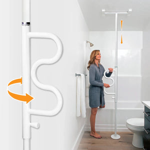 Woman using a white grab bar in a bathroom setting - okotoks hc pharmacy