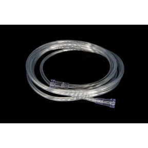 Clear plastic tubing with connectors on a black background - okotoks hc pharmacy