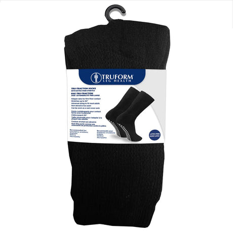 Pack of black Truform compression socks on a white background - okotoks hc pharmacy