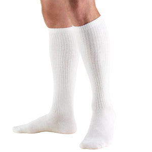 White knee-high socks worn by a person on a white background - okotoks hc pharmacy