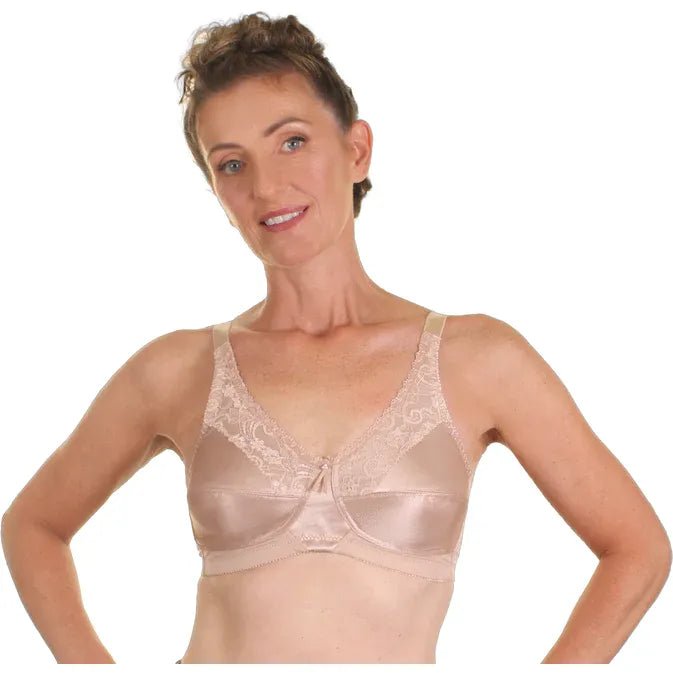 Woman wearing a beige bra on a white background - okotoks hc pharmacy