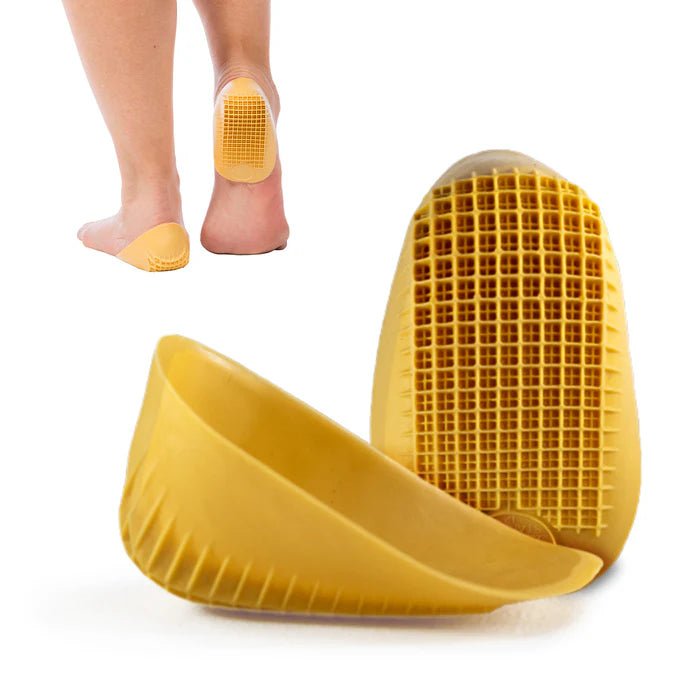 Yellow foot-shaped device with textured sole on a white background - okotoks hc pharmacy