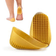 Yellow foot-shaped device with textured sole on a white background - okotoks hc pharmacy