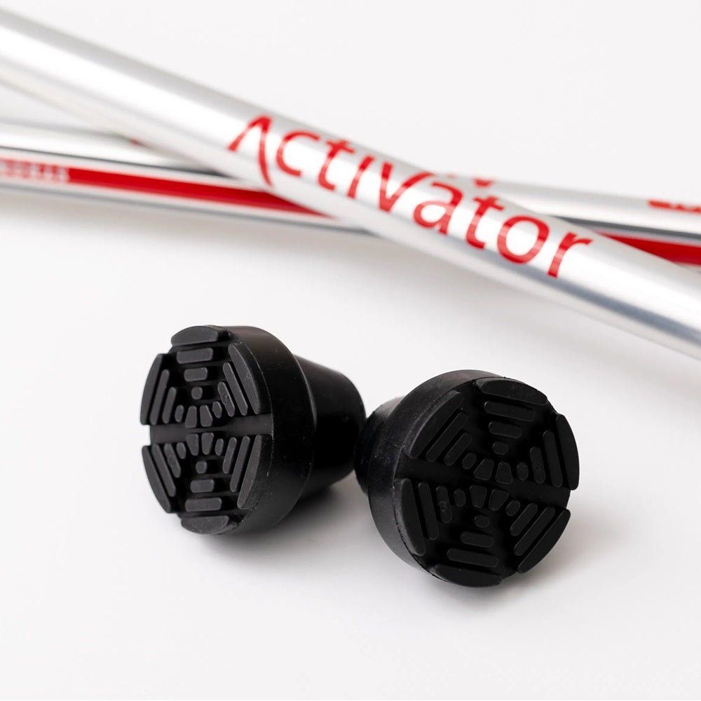 Two black rubber tips on a white background with 'Activator' branding. - okotoks hc pharmacy