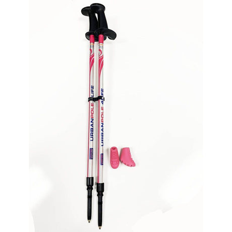 Two pink and black hiking poles with protective caps on a white background - okotoks hc pharmacy