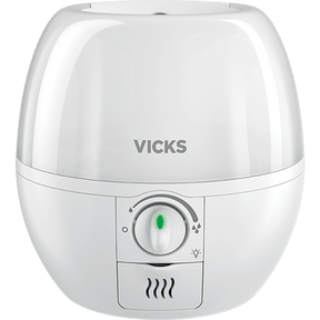 A white Vicks humidifier with a rounded, dome-like top and a control dial on the front, shown against a plain white background. - okotoks hc pharmacy