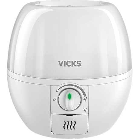 A white Vicks humidifier with a rounded, dome-like top and a control dial on the front, shown against a plain white background. - okotoks hc pharmacy