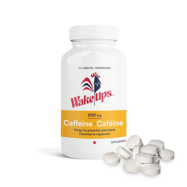 Bottle of Wakeups caffeine tablets with packaging and loose tablets on a white background - okotoks hc pharmacy