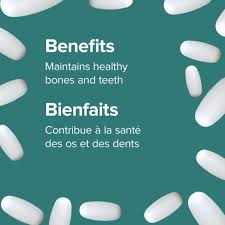 White pills on a teal background with text about bone and teeth health. - okotoks hc pharmacy
